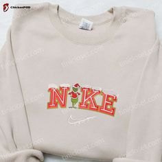 Introducing the Grinch Snow x Nike Embroidered Shirt, the perfect blend of style and holiday spirit. Made with high-quality materials and meticulously embroidered, this shirt showcases the iconic Grinch character in a unique and festive design. The soft and comfortable fabric ensures a cozy fit, making it ideal for the winter season. Whether you’re out spreading holiday cheer or lounging at home, this shirt is a must-have for any Grinch fan. Perfect as a gift for family members, it will su Custom Nike Crewneck Disney, Nike Vintage Sweatshirt Stitch, Stitch Sweatshirt Nike, Pull Nike Stitch, Nike Christmas, Grinch Baby, Nike Cartoon, Disney Character Shirts, Nike Inspiration