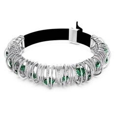 This intricate Hyperbola choker combines beauty with complexity, delivering a sublime example of Swarovski savoir-faire. The rhodium plated design features an array of spirals, each embellished with shimmering pavé in various cuts. Radiant green crystals are then encased within the choker band, revealing bold glowing color and exquisite faceting. Destined to be the star of your jewelry collection. Eternal Beauty, Bracelet Tennis, Holiday Earrings, Statement Choker, Statement Choker Necklace, Swarovski Necklace, Holiday Earring, Swarovski Jewelry, Green Crystals