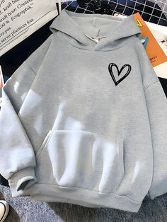 Trendy Cotton Hoodie With Cozy Fit, Trendy Cotton Cozy Fit Hoodie, Comfortable Cotton Trendy Hoodie, Cotton Heart-shaped Top For Winter, Heart-shaped Cotton Winter Top, Trendy Heart Graphic Sweatshirt For Winter, Trendy Winter Sweatshirt With Heart Graphic, Cotton Sweatshirt With Heart Graphic For Winter, Trendy Heart Graphic Sweatshirt For Fall