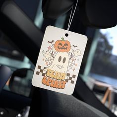 a car air freshener hanging from the dashboard