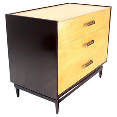 a black and yellow dresser with two drawers