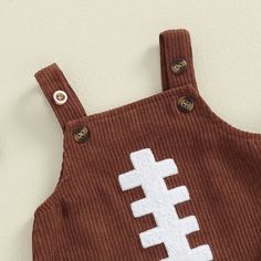 Includes: OnesieMaterial: PolyesterGender: Boys & GirlsPattern: FootballSleeve Length: SleevelessSummary: Baby Toddler Sleeveless Button Corduroy Football Onesie Cute Brown Sleeveless Top, Bodysuit Fall Outfit, Fall Bodysuit Outfit, Football Embroidery, Football Onesie, Girls Overalls, Summer Baby, Fall Outfit