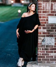 The Nolita Maternity Dress Fall Maternity Maxi Dress, Flowy Maxi Dress For Maternity In Fall, Flowy Maternity Maxi Dress For Fall, Oversized Black Maxi Dress For Fall, Chic Maternity Dress For Fall, Black Maternity Dress Bump Friendly, Maternity Black Dress Bump Friendly, Maternity Black Bump Friendly Dress, Maternity Black Bump-friendly Dress