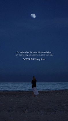 a woman standing on top of a sandy beach under a full moon with a quote above her