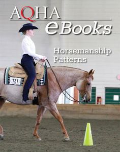 a woman riding on the back of a brown horse