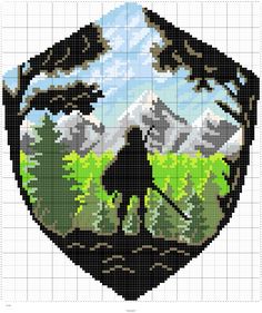 a cross stitch pattern with an image of a bear in the woods and mountains on it