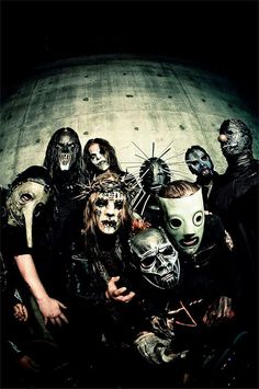 a group of people with masks on their faces