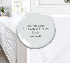 the kitchen walls are painted white and there is a sign that says, kitchen walls shewn williams icicle sw 9238