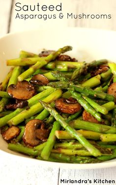 asparagus, mushrooms and other vegetables in a white bowl