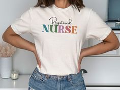 a woman standing with her hands on her hips wearing a t - shirt that says practical nurse