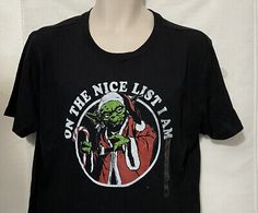 a black t - shirt with an image of yoda on it