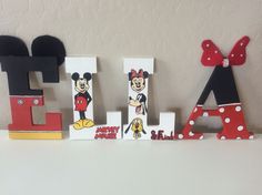 the letters are decorated with mickey and minnie mouses