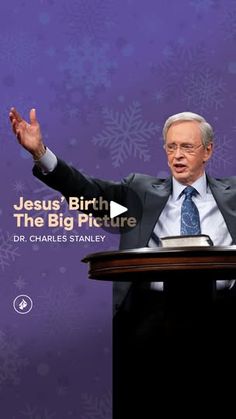 a man standing at a podium with his hands up in front of him and the words jesus'birth is the big picture