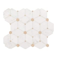 the white and gold hexagonal marble mosaic tile is shown on a white background