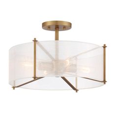 a semi - flush ceiling light fixture with white fabric shades on the bottom and gold accents