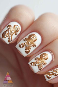 Fun gingerbread man nails to brighten up your Christmas! 🎄 These adorable xmas nails are a must for anyone looking to add a bit of holiday cheer to their manicure. Find more cute Christmas nail designs on nailhow.com and save this pin for your December nails inspo! Xmas Nails Gingerbread Man, Christmas Nails Gingerbread Man Pink, Simple Gingerbread Nails, Gingerbread Cookie Nails, Gingerbread Christmas Nails, Gingerbread Man Nail Art, Gingerbread Nail Art, Gingerbread Man Nails