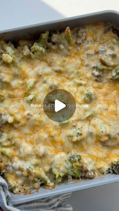 a casserole dish filled with broccoli and cheese