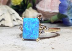 Don't miss this opportunity to own this beautiful gemstone ring crafted in 14k gold filled => Gemstone Type - Opal, Clear Quartz => Gemstone Cut - Cabochon, Faceted => Gemstone Size - 8*10 mm, 2 mm => Total Number of Gemstones - 7 => Metal Type - 14k Gold Filled (Tarnish Resistant And Nickel Free) - also available in 925 sterling silver * Please contact me for pricing on a sizes larger than 11 * ~ Feel free to ask me about custom made designs. ❏ Replacements and custom orders : ✪ Gia Certified Rectangular Diamond Ring, Fine Jewelry Rectangular Rings With Accent Stones, Fine Jewelry Rectangular Birthstone Rings, Rectangular Birthstone Ring In Fine Jewelry Style, Rectangular Birthstone Rings Fine Jewelry, Rectangular Rings With Gemstone Accents, Fine Jewelry, Rectangular Rings With Gemstone Accents In Fine Jewelry Style, Fine Jewelry Rectangular Ring With Gemstone Accents, Rectangular Rings With Accent Stones For Anniversary