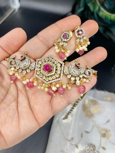 We bring beautiful Jewelry sure to elevate any look! Kindly pay attention to all photos and video and ask questions about the item prior to ordering. Elegant Pink Kundan Jewelry Sets, Elegant Pink Kundan Sets, Festive Pink Jewelry With Intricate Design, Elegant Pink Gift Sets, Pink Jewelry Sets For Party And Festivals, Handmade Pink Bridal Necklace For Wedding, Pink Jewelry With Intricate Design For Party, Pink Jewelry Sets With Tilla As Gift, Pink Kundan Jewelry With Intricate Design