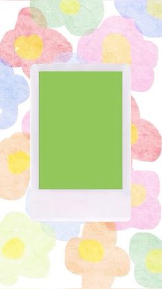 an image of a green square in the middle of some colorful flowered paper with pastel colors