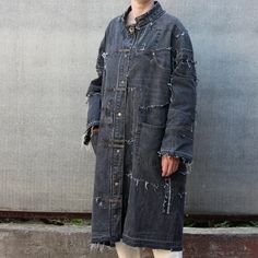 "Ripped grey denim coat is ART & UNIQUE! item on Etsy! Oversize grey robe for man and woman. Unisex distressed jeans long jacket ready to ship) Dimensions: (please see last photo) Length on the back - 43\" - 110 cm Underarm to underarm 26\" - 65cm Sleeve length from neck to bottom - 31\" - 79cm Sleeve length 23\" - 59cm Shoulder - 8\" - 20cm Closes on a button. 9 pockets for use! Without lining The material is thoroughly cleaned and restored. Created in a pet-free and smoke-free home! There may be some color discrepancies which is due to the different monitor settings. Please see more patchwork denim coats here https://www.etsy.com/shop/ZinaNatko?ref=seller-platform-mcnav&section_id=25815740 All things are done in a single copy! Thank you for purchasing recycled denim and helping reduce ou Patchwork Jean Jacket, Oversize Jeans, Black Mantle, Ripped Denim Jacket, Jeans Long, Oversized Jeans, Patchwork Jacket, Denim Hat, Cotton Clothing