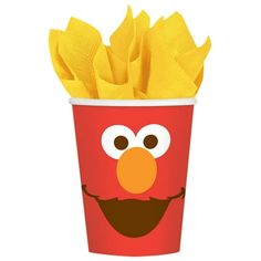 a red cup filled with fries and an angry bird face