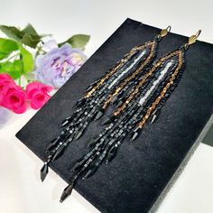 "My new Japanese beaded long earrings.Earrings are made mainly of black colors with the addition of silver and bronze.Seed Bead Earrings 5 inch long.Flowing beads earrings.Bohemian dangle beaded earrings. with fringe are made of high quality Japanese seed beads. long earrings.Bead weaving techniques. Colors: Brilliant black,matt black,bronze,silver. ! Details ! Made with quality Japanese seed beads ! Professional threads for weaving with beads Tytan and Fireline. ! Length 5.5 inches ( 11cm) ! Br Dangle Beaded Earrings, Earrings Bead, Trend Jewelry, Japanese Beads, Long Fringe, Long Fringes, Beads Earrings, Earrings Bohemian, Black Earrings