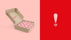 an open box with hearts on it next to a red and white box that says love