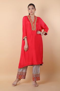 Light red kaftan style kurta with mirror, thread and sequins embroidered neckline and cuffs. Comes with pant. - Aza Fashions Anarkali Kurta With Embroidered Neckline For Parties, Festive Embroidered Straight Kurta, Bollywood Style Festive Tunic With Dabka Work, Festive Bollywood Salwar Kameez With Embroidered Neckline, Bollywood Style Anarkali Set With Embroidered Neckline For Eid, Bollywood Style Kurta With Embroidered Neckline For Navratri, Bollywood Style Festive Sets With Embroidered Neckline, Anarkali Kurta With Embroidered Neckline For Festive, Anarkali Kurta With Embroidered Neckline For Festive Occasions