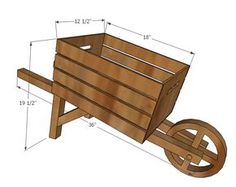 a wooden wagon is shown with measurements for the wheelbarrow and seat on it