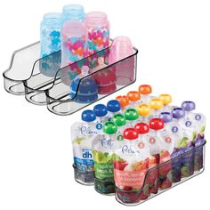 two plastic containers filled with different colored candies on top of each other and one container full of jelly beans