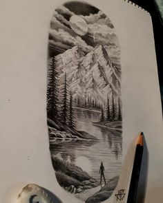 a pencil drawing of a man standing in front of a lake with mountains and trees