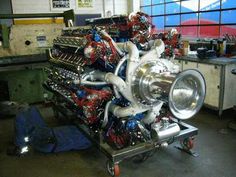 an engine is being worked on in a factory