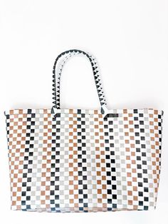 The Sunny Weaved Tote is available in 2 colors, neutral and bright. With its large size and adorable design, it is the perfect accessory for a day at the beach. Stay stylish and organized with this must-have tote. A Day At The Beach, Shoe Gifts, Day At The Beach, 2 Colours, At The Beach, Dress Accessories, Large Size, Sunnies, Must Haves