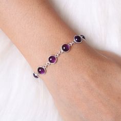 "Amethyst Bracelet, 925 Sterling Silver Bracelet, February Birthstone Bracelet, Gemstone Jewelry, Handmade Bracelet, Birthday Gift For Her Gemstone - Amethyst Stone Quality - AAA Weight - 6.36 gm Stone Length- 0.7 cm, Stone Width - 0.7 cm Bracelet Length - 6 inch to 9 Inch sizes are available, we give extra 0.5 inch adjustable in every bracelet. Stone Shape - As shown in the picture We serve complete 925 sterling silver Jewelry and genuine properties of the stone. The products are dispatched fro Adjustable Sterling Silver Amethyst Gemstone Bracelet, Elegant Sterling Silver Amethyst Bracelet, Elegant Sterling Silver Amethyst Gemstone Bracelet, Formal Sterling Silver Amethyst Bracelet, Amethyst Multi-stone Bracelet Gift, Bracelet Stone, Adjustable Jewelry, Birthstone Bracelet, Bracelet Gemstone