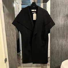 Nwt. Size S However It’s Roomy. Would Describe It As Oversized. 56% Wool 2 Deep Pockets, Handmade Elegant Sleeves Coat. Versatile And Timeless, Perfect For Casual, Work, Or Evening Outing. Chic Sleeveless Outerwear For Layering, Zara Black Outerwear For Layering, Modern Sleeveless Outerwear For Work, Chic Black Sleeveless Outerwear, Chic Sleeveless Outerwear For Daywear, Chic Zara Winter Vest, Elegant Zara Winter Vest, Elegant Sleeveless Zara Outerwear, Zara Sleeveless Outerwear For Fall