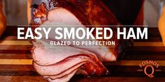 a ham on a cutting board with the words easy smoked ham glazed to perfection