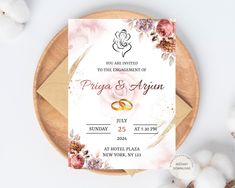 the wedding card is sitting on top of a wooden plate