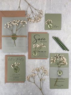 wedding stationery with flowers and save the date cards