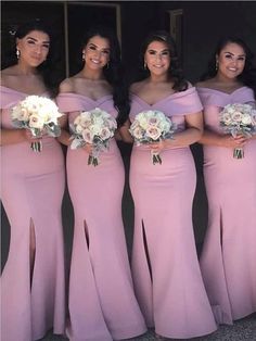 the bridesmaids are all dressed in pink gowns and holding their bouquets