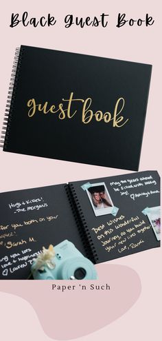 a black guest book with gold writing on it and a camera next to the cover