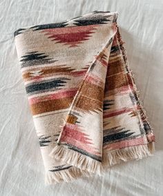 two blankets folded on top of each other