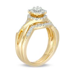 a yellow gold engagement ring set with diamonds