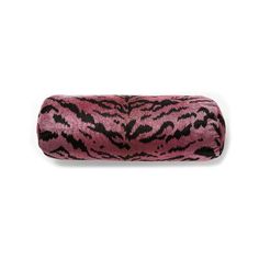 a pink and black animal print pillow on a white background