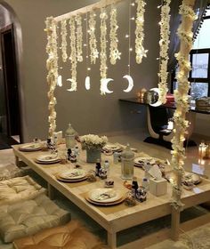 the table is set with plates and place settings for two people to sit down at