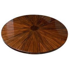 an image of a wooden table top with sunburst pattern on the side and bottom