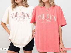 two women standing next to each other wearing matching t - shirts that read the bride and groom club