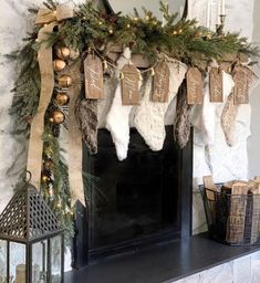 a mantel decorated with stockings and christmas decorations