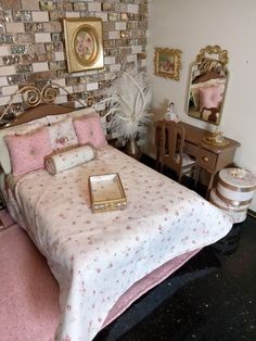 a doll house bedroom with a bed, dresser and mirror on the wall behind it