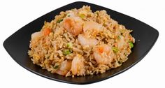 shrimp and rice is served on a black plate